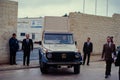 Pope mobile with security men on John Paul II's 1998 visit to Portugal