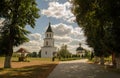 The poplar alley leads to the white bell tower and to the prayer cross in Barkalabovo Holy Ascension Monastery.