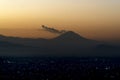 Popocatepetl Volcano erupting near mexico city aerial view at sunrise