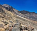 Popocatepetl volcano in Mexico, Tourist on the peak of high rocks. Sport and active life concept Royalty Free Stock Photo