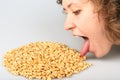 Popped wheat grains and girl Royalty Free Stock Photo