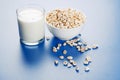 Popped wheat seeds and glass of milk Royalty Free Stock Photo