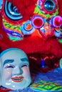 Popper smiling mask and red lion dance costume prepare for Chine Royalty Free Stock Photo