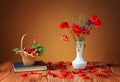 Poppies in a vase, and cherries Royalty Free Stock Photo