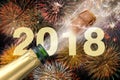 Popping champagne and fireworks at new years eve 2018 Royalty Free Stock Photo