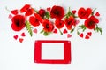 Poppy flowers and red wooden frame on white Royalty Free Stock Photo