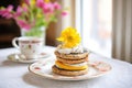 poppy seed bagel with cream cheese on a glass plate Royalty Free Stock Photo