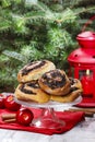 Poppy seed buns on cake stand. Christmas eve setting Royalty Free Stock Photo