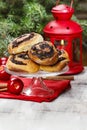 Poppy seed buns on cake stand. Christmas eve setting