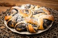 Poppy seed cake on the wooden rustic background.