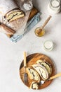 Poppy seed roll or strudel on wooden board sprinkled with powdered sugar. Royalty Free Stock Photo