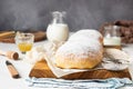 Poppy seed roll or strudel on wooden board sprinkled with powdered sugar. Royalty Free Stock Photo