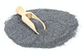 Poppy seed with a wooden shovel in the pile Royalty Free Stock Photo