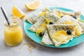 Poppy seeds crepes with lemon curd and fresh blueberry