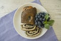 Poppy seeds strudel with cup of coffee and blueberry Royalty Free Stock Photo