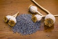 Poppy seeds on wooden table