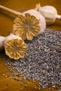 Poppy seeds on wooden table