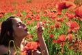 Poppy, Summer, spring, poppy flower. Woman blow bubble in poppy field, dreams.