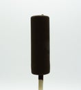 Popsicle ice cream in chocolate colored glaze isolated on a white background Royalty Free Stock Photo