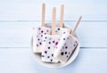 Popsicles from yogurt, blueberry and blackcurrant