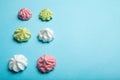 Popular air meringue pies on a blue background, empty space for text Royalty Free Stock Photo