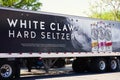 Popular alcohol beverage White Claw Hard Seltzer brand marketing on delivery truck