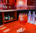 Popular Aperol Spritz cocktail in an original glass on the bar table top