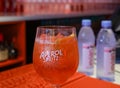 Popular Aperol Spritz cocktail in an original glass on the bar table top