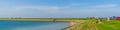 Popular beach of Tholen with visitors during summer season, Bergse diepsluis, Oesterdam, The netherlands, april 22, 2019