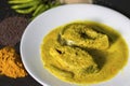 Popular Bengali Illish/Hilsa fish curry with grinned mustard seed. Royalty Free Stock Photo