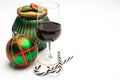 Popular british christmas drink, glass of vintage ruby port wine and christmas tree decoration