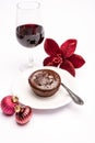 Popular british christmas food, glass of vintage ruby port wine and hot chocolate cake with christmas tree decoration on