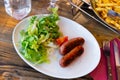 Popular dish of European cuisine is Savoyard sausage Royalty Free Stock Photo