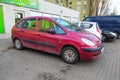 Classic red French Citroen Picasso private car parked