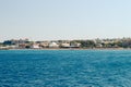 Popular Elli beach or Paralia Enidriou on island of Rhodes in Greece, Europe. Popular sandy city beach on sunny summer day. Royalty Free Stock Photo