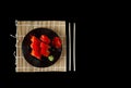 popular food. sushi, pickled ginger on a black plate. Served dish in Japanese style. Sushi chopsticks plate Royalty Free Stock Photo