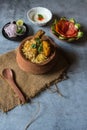 Popular Indian mughlai delicacy chicken biryani in an earthen pot Royalty Free Stock Photo