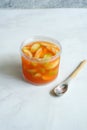 A popular Indonesian pickled kedondong fruit served in a clear plastic container Royalty Free Stock Photo