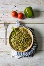 Popular Italian dish spaghetti with pesto sauce in a bowl Royalty Free Stock Photo