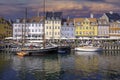 The popular Nyhavn harbour with cclorful houses in Copenhagen.