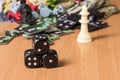 Popular objects for board games and a small pyramid of dark dice