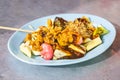 Popular Penang fruit rojak served with prawn paste and groundnuts Royalty Free Stock Photo