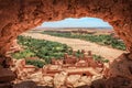 Popular point of view of the valley of the desolating river Onila through a hole in a wall of Ancient Kasbah in Ait-Ben Royalty Free Stock Photo