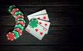 Popular poker game. Playing cards with a winning combination of two pairs on a black table in a poker club. Winning in sports