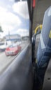 Inside the bus sitting at the back of public transport