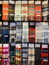 Iconic tartan scarves on sale in Scotland capital Edinburgh with many patterns