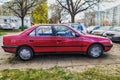 Classic red French Peugeot 405 GL sedan private car parked