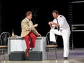 Popular Russian actors Dmitry Isaev and Sergey Astakhov during a performance on the stage of the theater