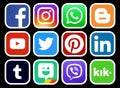 Popular social media icons with white rim on black background Royalty Free Stock Photo