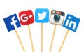 Popular social media logo signs printed on paper, cut and pasted on wooden stick